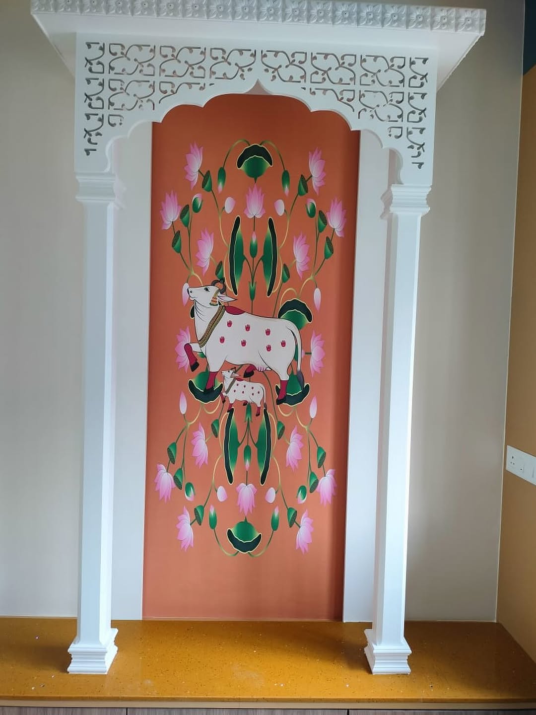 Designer wallpaper installation in a Pune home by Nafees Decor