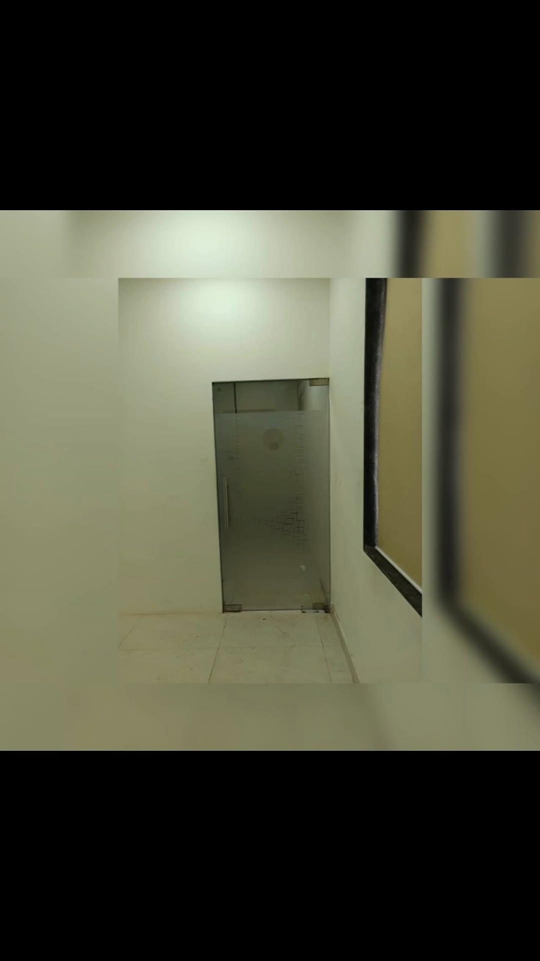 Office interior with frosted glass film and modern blinds in Pune